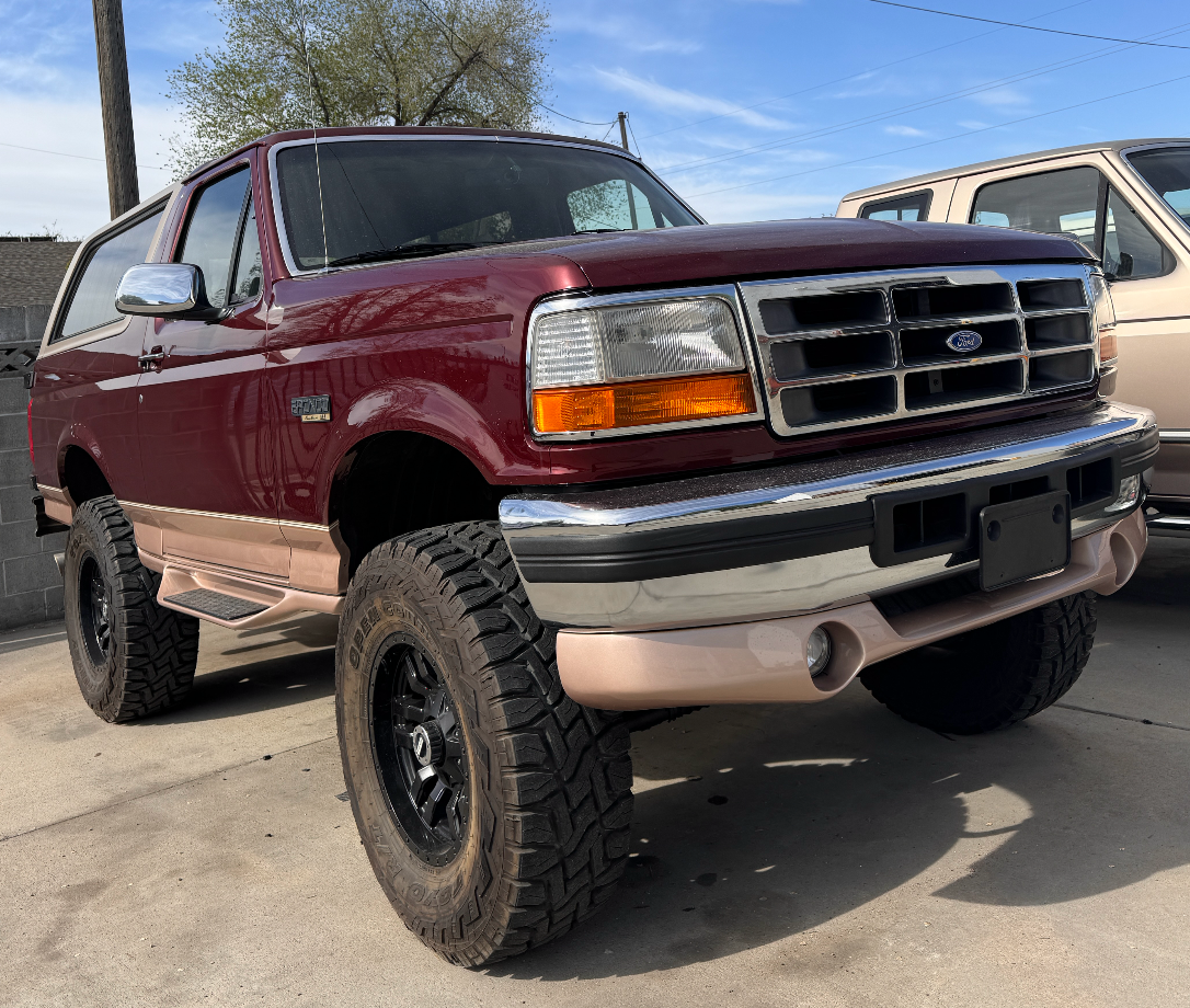 Lifted 1990's Ford Bronco at Sexton Offroad in Salt Lake City and Park City, UT, featuring custom suspension upgrades for improved off-road performance and rugged style.