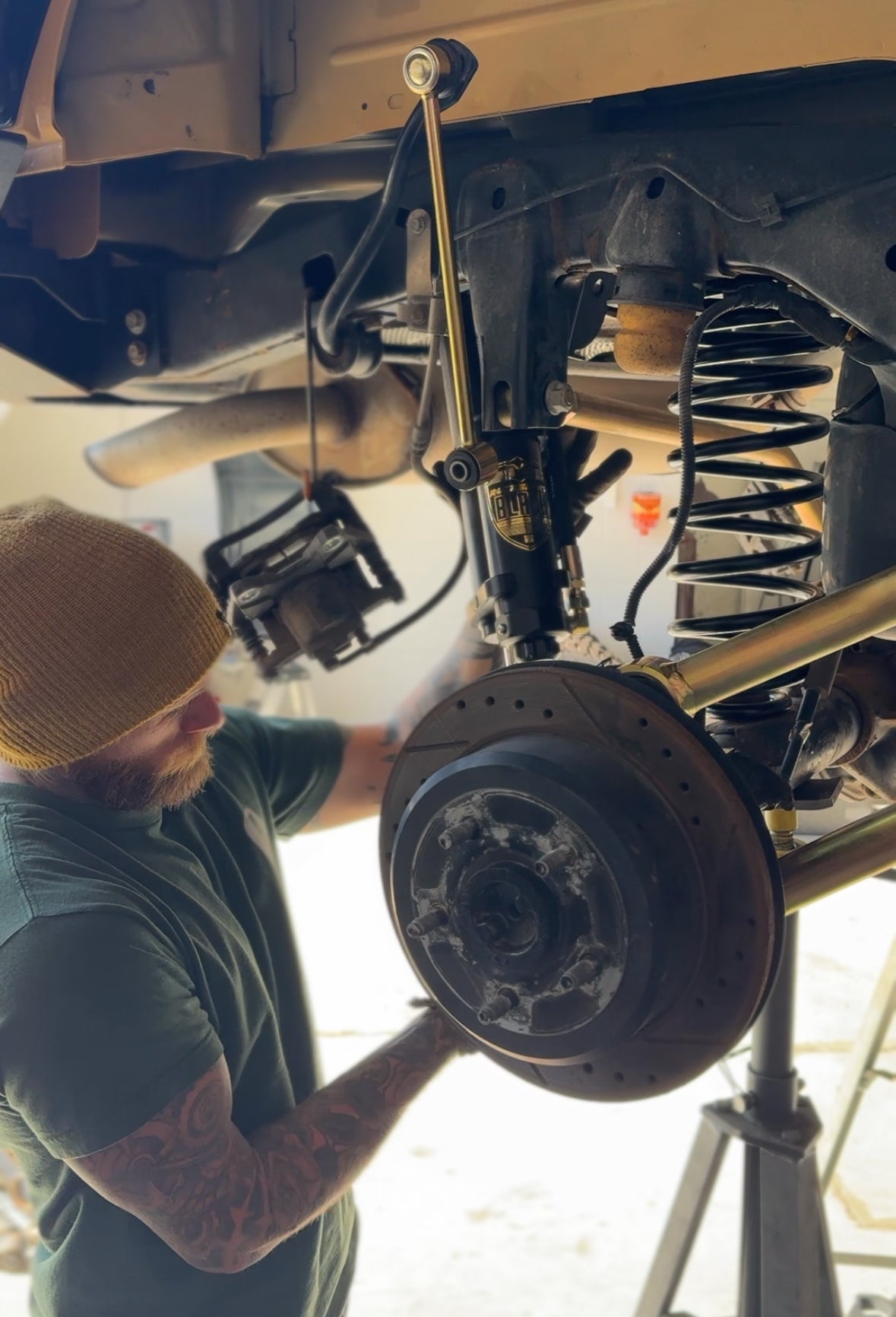 Installing coil springs at Sexton Offroad in Salt Lake City and Park City, UT, to improve suspension performance and off-road handling.